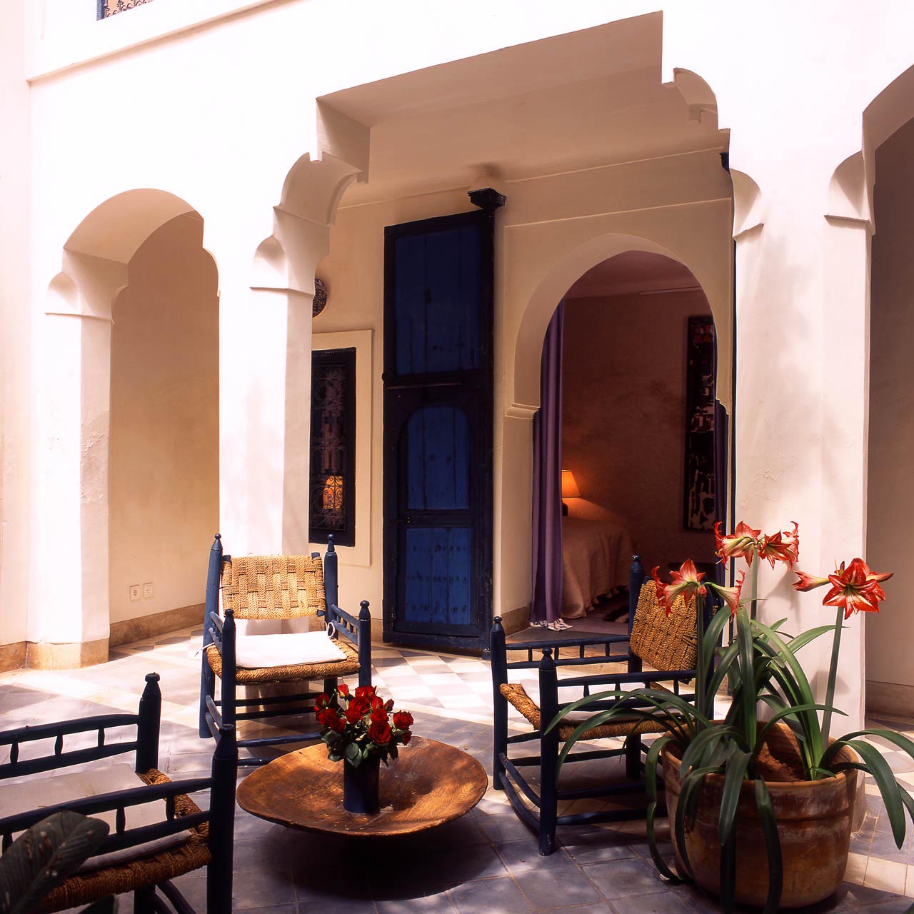 Relax in the private patio in front of the Blue Room